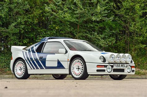 Iconic Ford RS200 rally car in action, showcasing its aggressive design and performance.