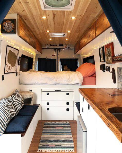 Spacious interior of a Ford Transit conversion van showcasing customization options