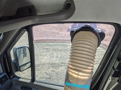 Ford Transit van with open middle windows for ventilation