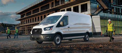 A fleet of diverse Ford Transit van models lined up, showcasing their versatility for business.