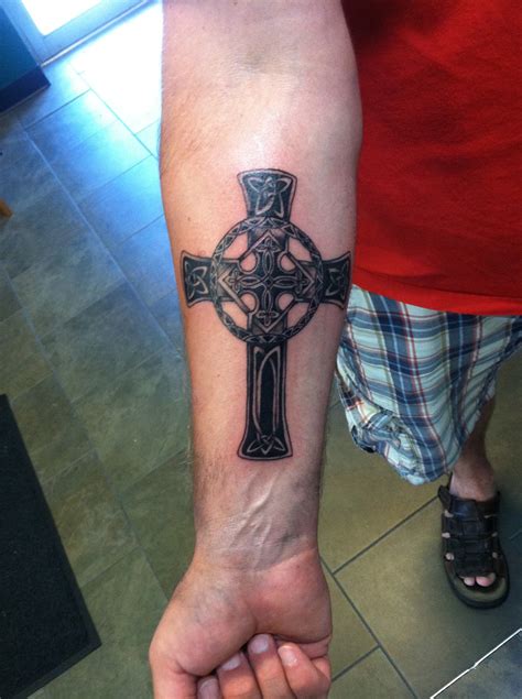 Famous Forearm Cross Tattoo Designs References