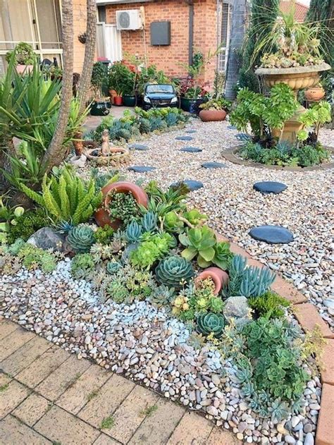 It's all here September 2015 Succulent landscaping front yard