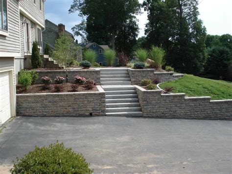 Diy retaining wall along driveway! Done in one weekend! Yard stones