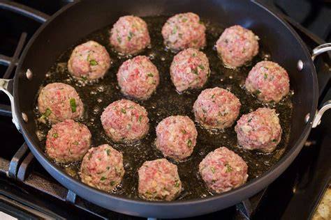 Meatballs on frying pan