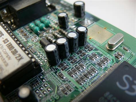 function of capacitor in computer motherboard