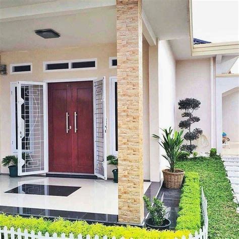 Gambar Rumah Minimalis dengan Desain Pintu Masuk yang Megah