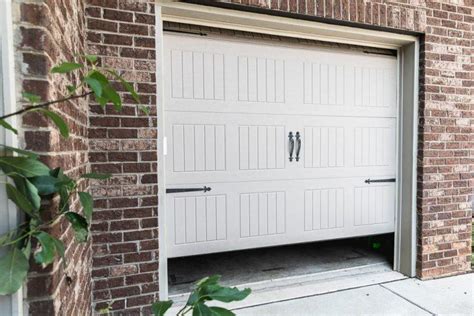 home.furnitureanddecorny.com:garage door only goes up a foot and stops