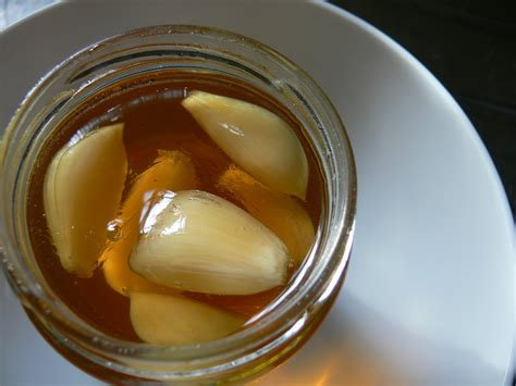 garlic cloves soaking in apple cider vinegar