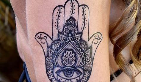 Geometric patterned hamsa hand tattoo with all seeing eye