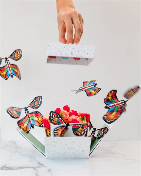 gift with butterflies flying out