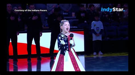 girl sings national anthem at pacers game