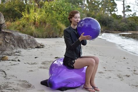 girl sit on balloon