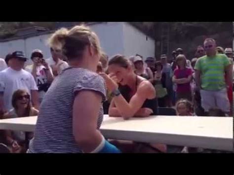 girl snaps arm while arm wrestling