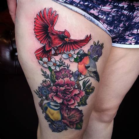 girl thigh tattoos with meaning