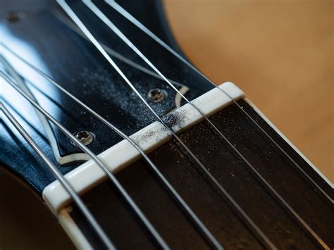 Stegeinlage und Sattel Knochen oder Kunststoff? Stoll Gitarrenbau