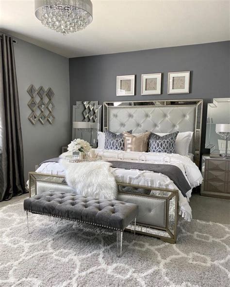 Image of a grey bedroom with an accent chair