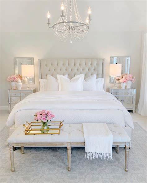 Image of a grey bedroom with mirrors