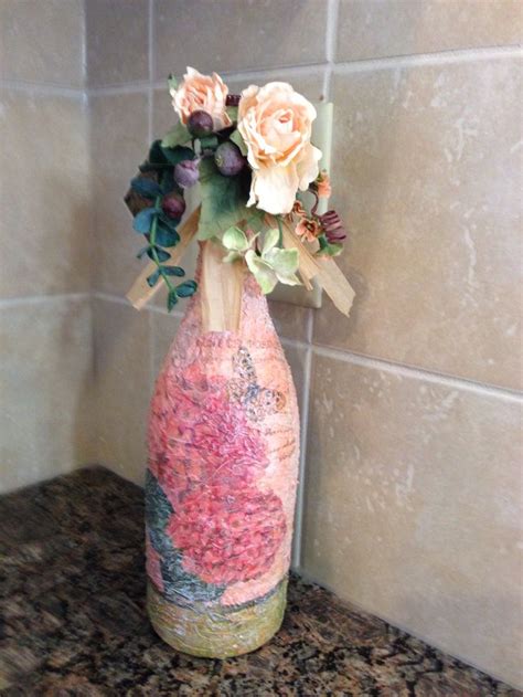 Glass bottle decoupage with eggshells