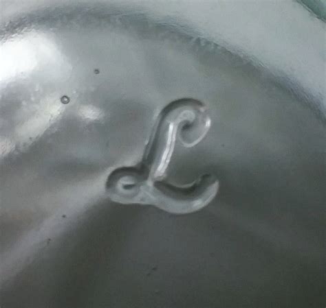 Glassware With A Cursive L On The Bottom