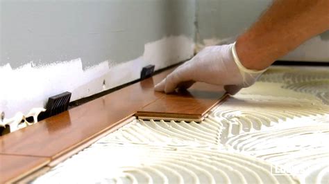 gluing engineered hardwood floors to concrete