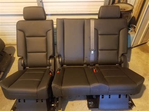 gmc acadia 2nd row captains chairs