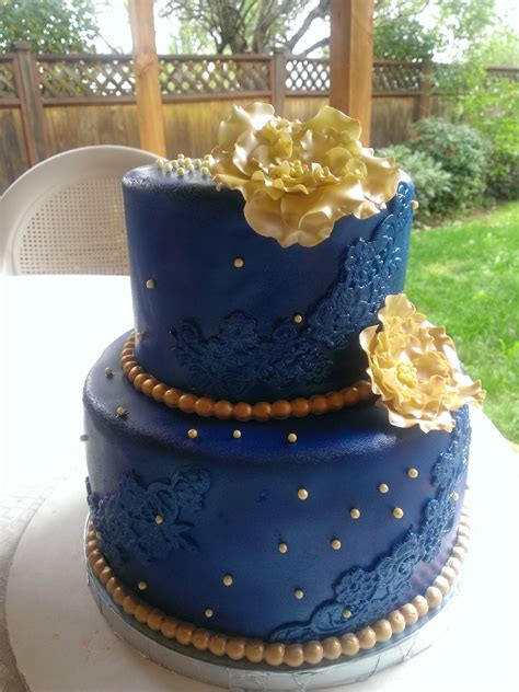 Glittering Gold And Royal Blue Cake: A Regal Delight