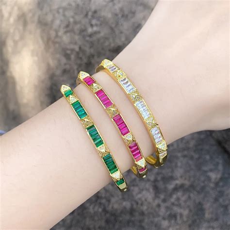 Gold And Fuchsia Bangles