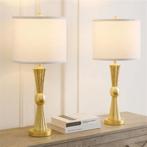 Gold base table lamp in a living room
