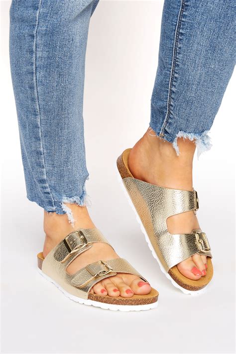 home.furnitureanddecorny.com:gold double buckle strap footbed sandals