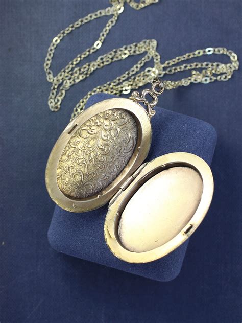 gold oval locket necklace