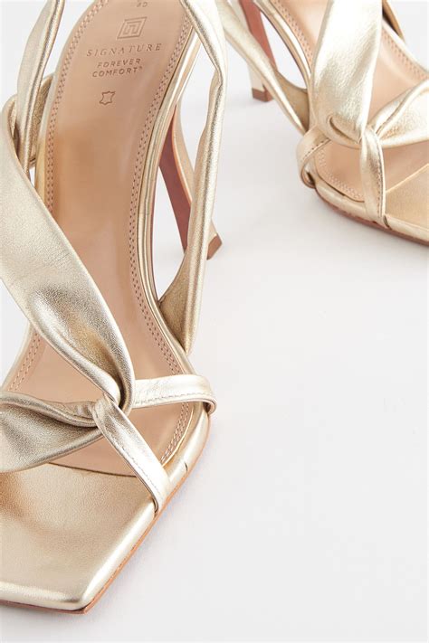 Gold metallic strappy wide fit wedge sandals River Island