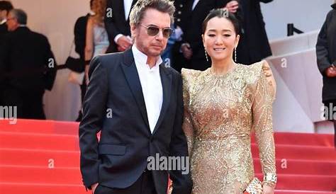 Chinese actress Gong Li, right, and her husband Jean-Michel Jarre pose