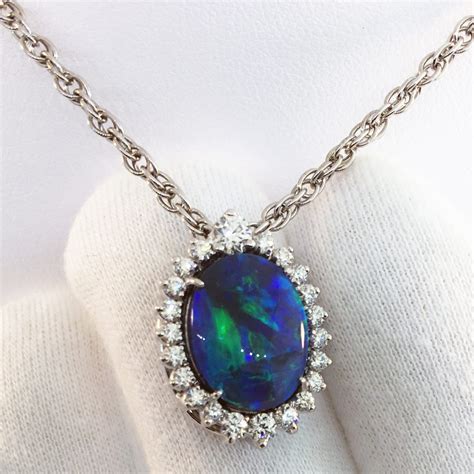 google 1 opal and 2 diamond necklace