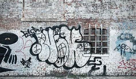 Street art: White on brick graffiti. | Street art, Street art graffiti, Art