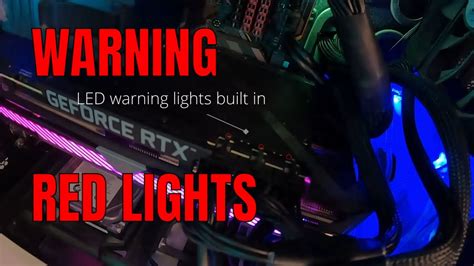 Closeup NVidia GeForce RTX 3080 Inside Gaming PC Tower with Colorful Backlights in Darkness