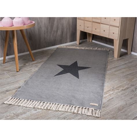 Bloomingville Rug Star print light grey. Teppich in hellgrau mit großem