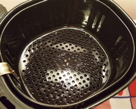 grease the air fryer basket