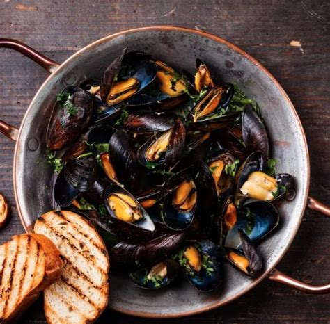 Mussels saganaki. stock image. Image of juicy, restaurant