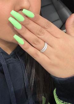 Exploring The Trend Of Green Under Acrylic Nails In 2023