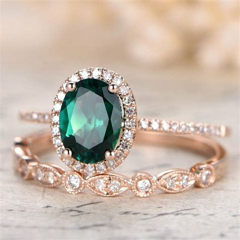 green emerald and diamond engagement rings