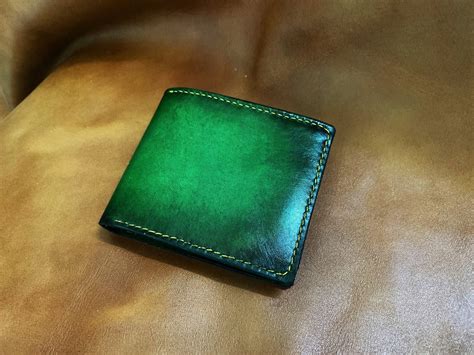 green wallet leather