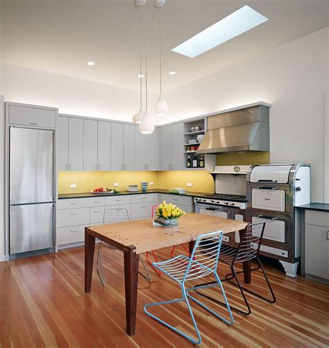 grey kitchen with yellow accents