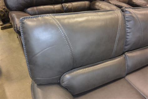 Grey Sofa With White Stitching