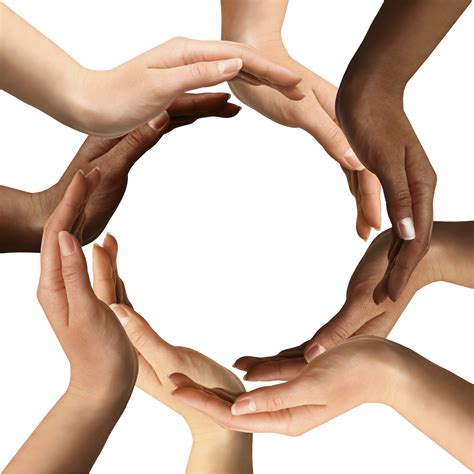 Image of a circle of people holding hands in a supportive manner.