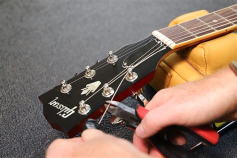 guitar center string repair