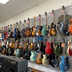 guitar repair shop near me prices