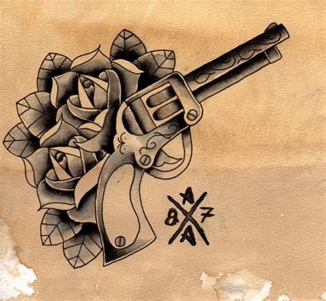 Crossed revolvers tattoo