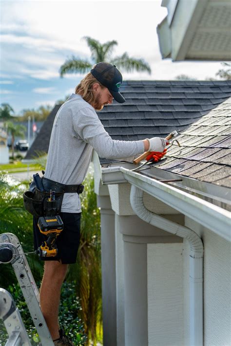 Gutter repair technician working