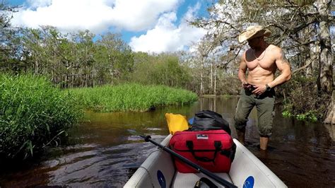 Guy Camping Surrounded By Alligators