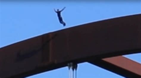guy falls off bridge